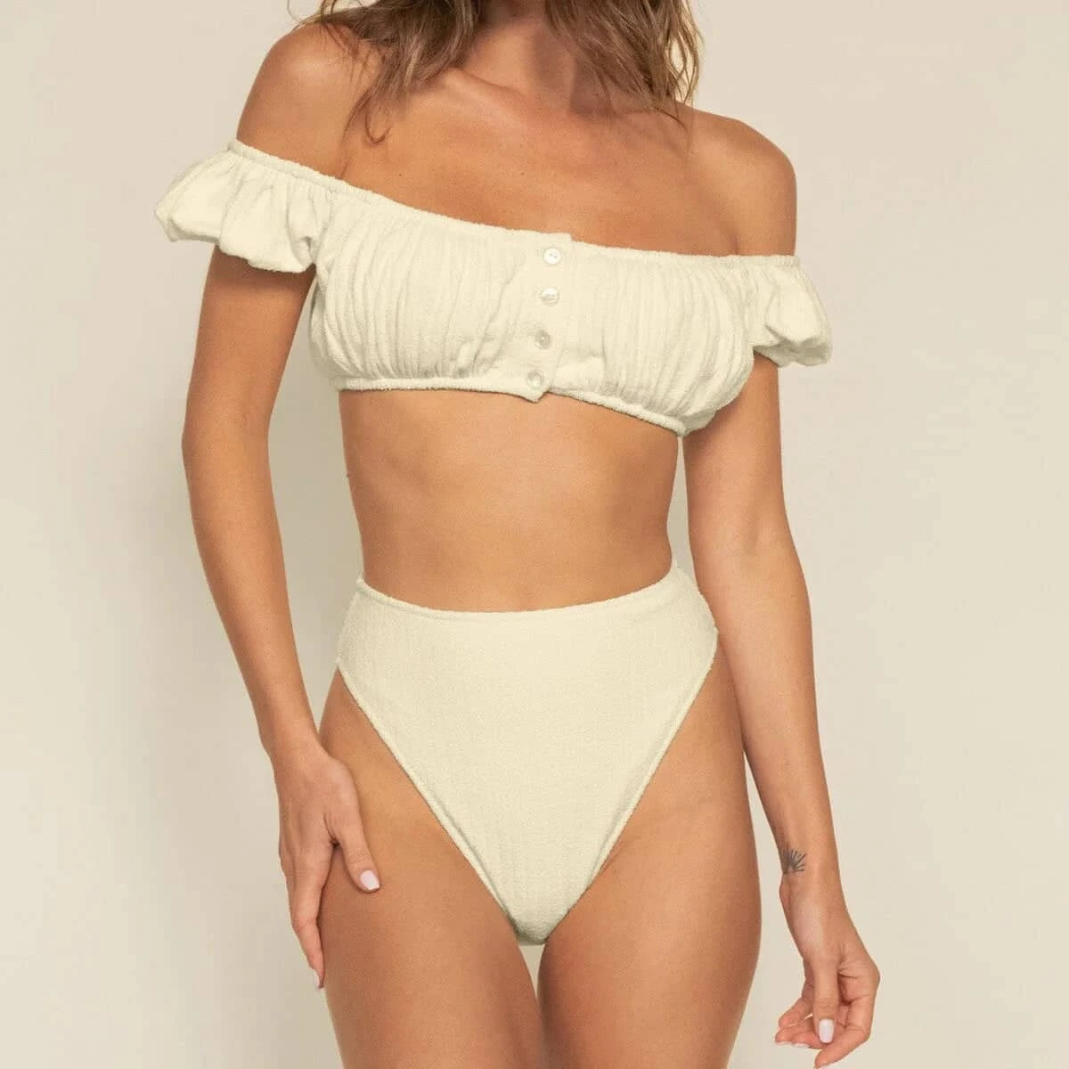 ButtercreamRib_PaulaBikiniBottom_studio_front.webp